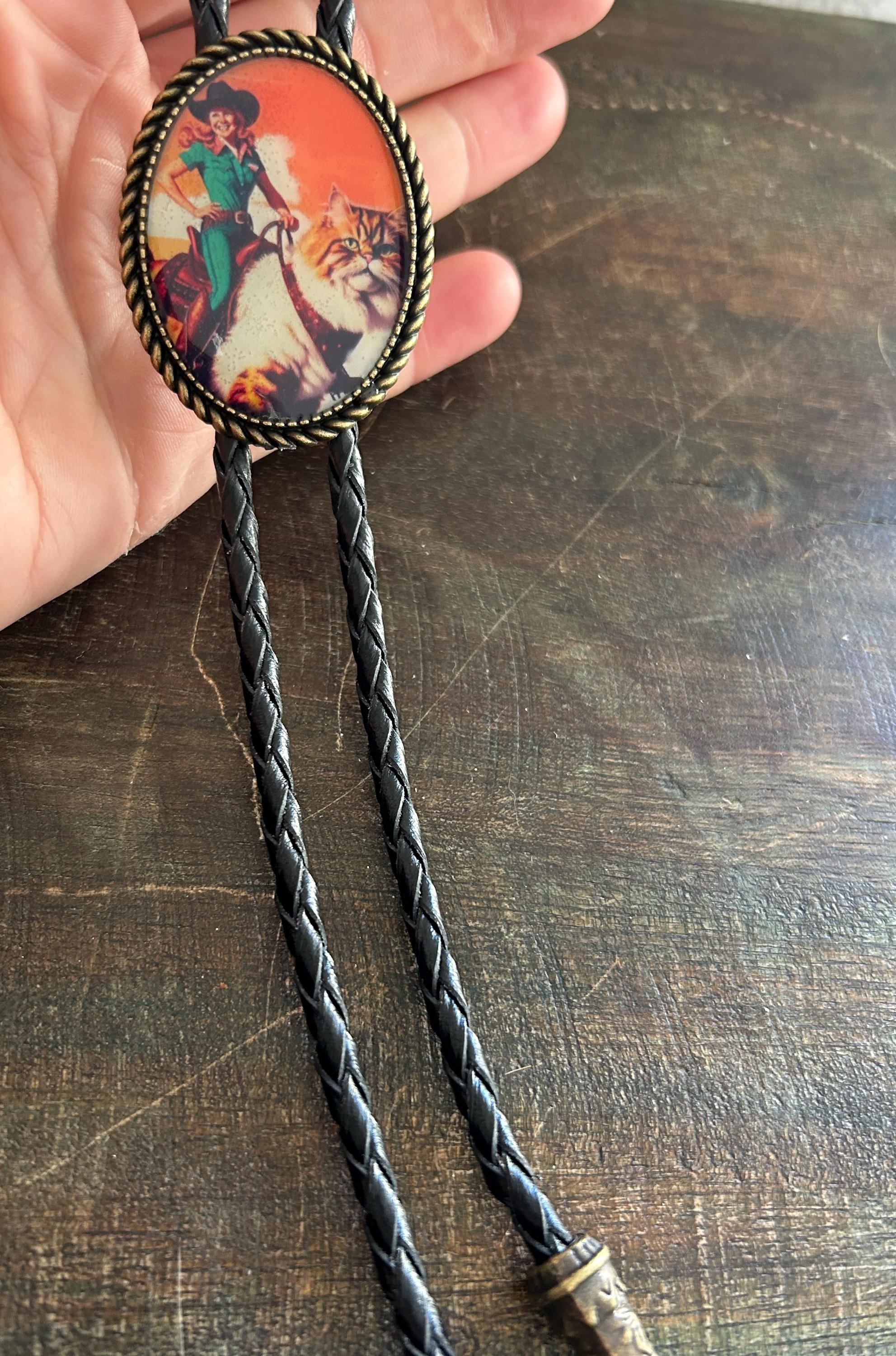 Cowgirl Riding Cat Bolo Tie