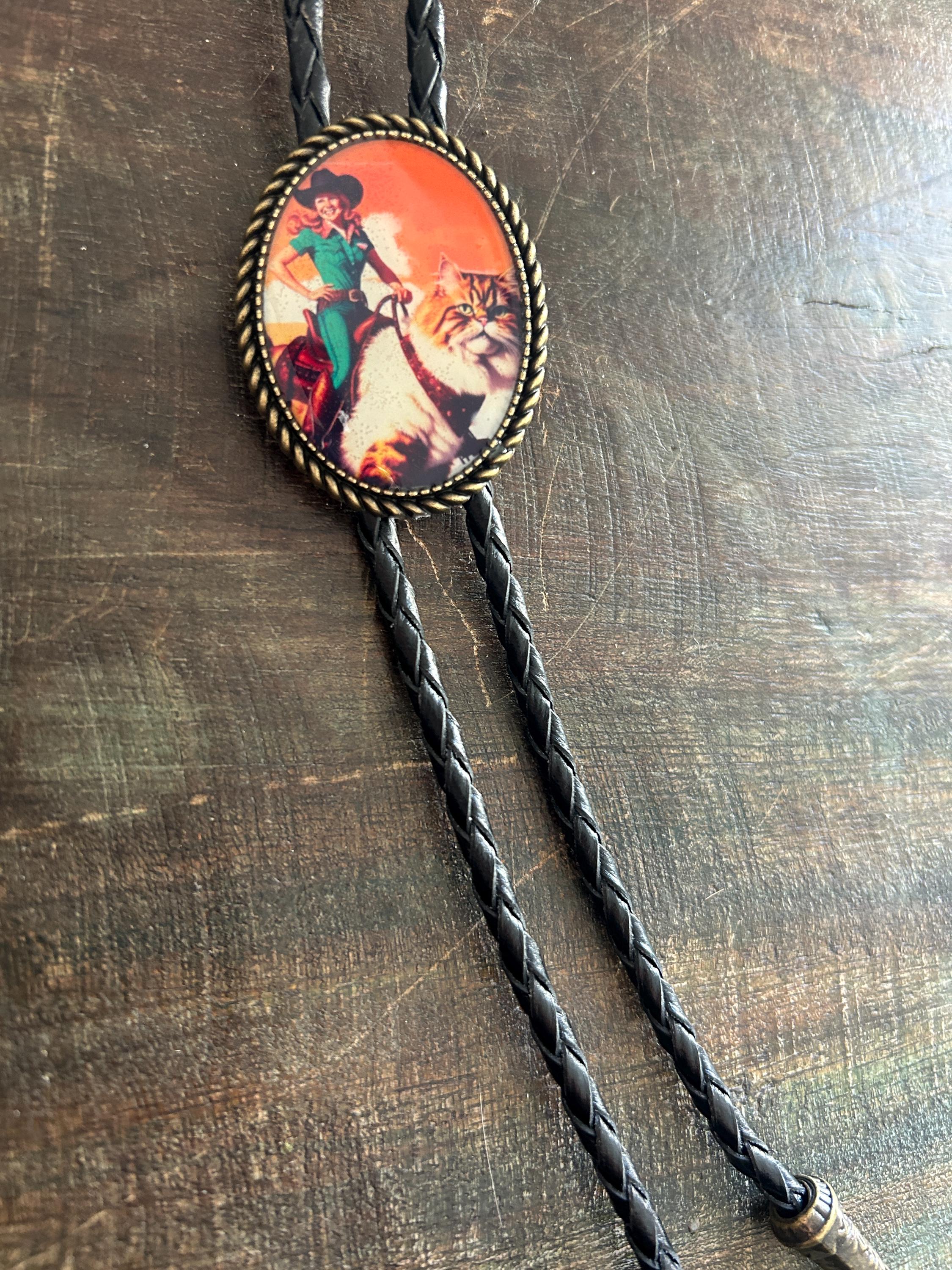 Cowgirl Riding Cat Bolo Tie