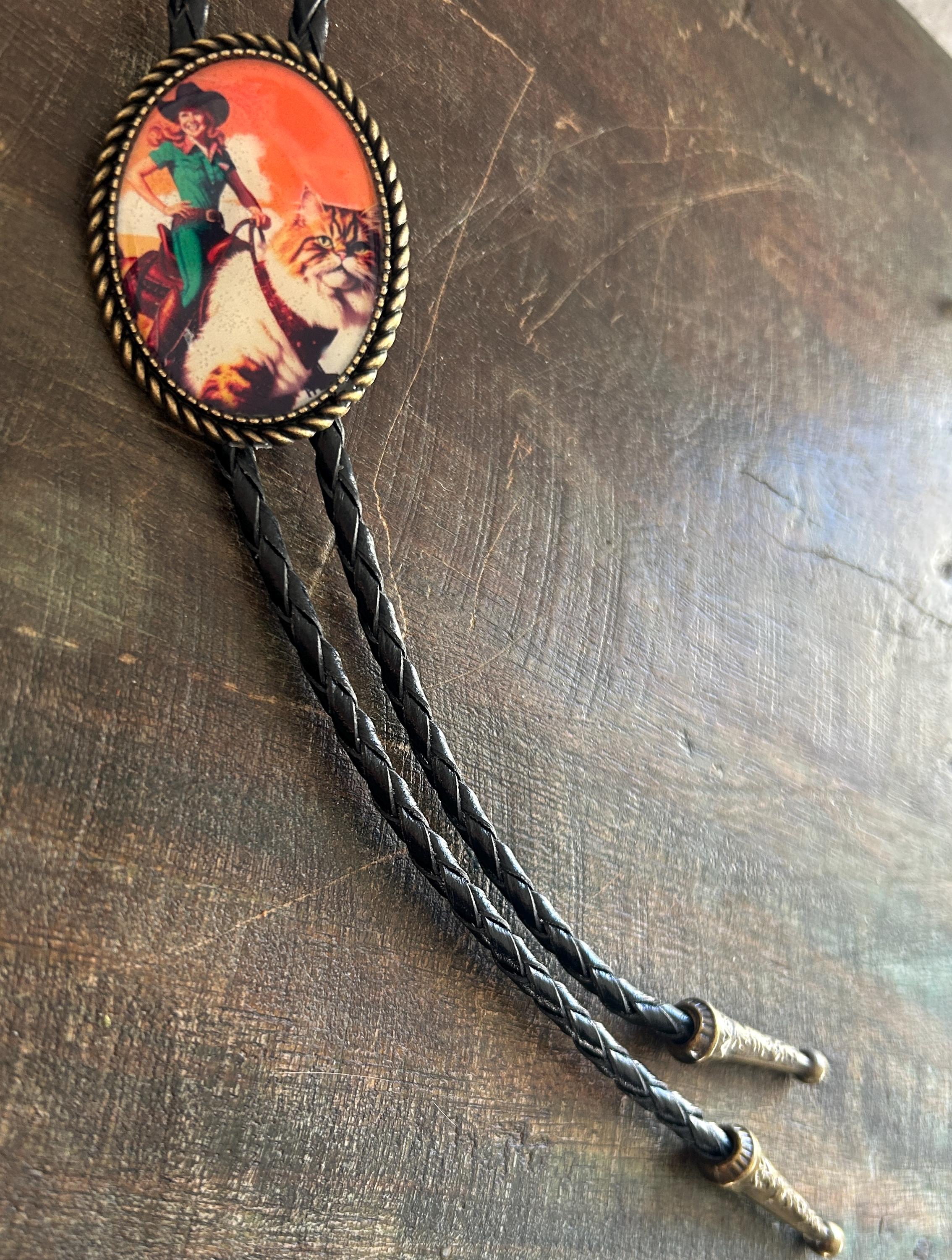 Cowgirl Riding Cat Bolo Tie