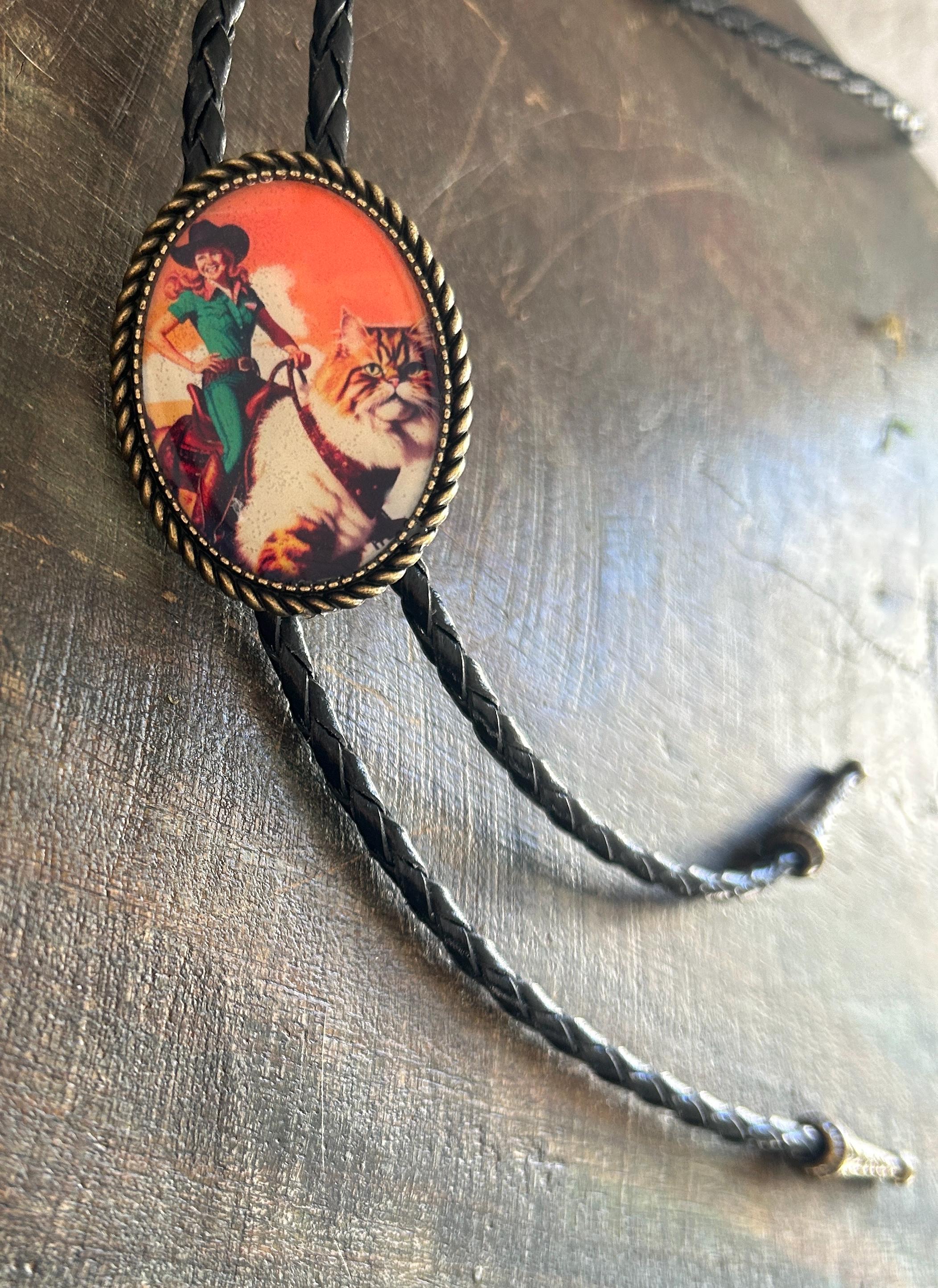Cowgirl Riding Cat Bolo Tie